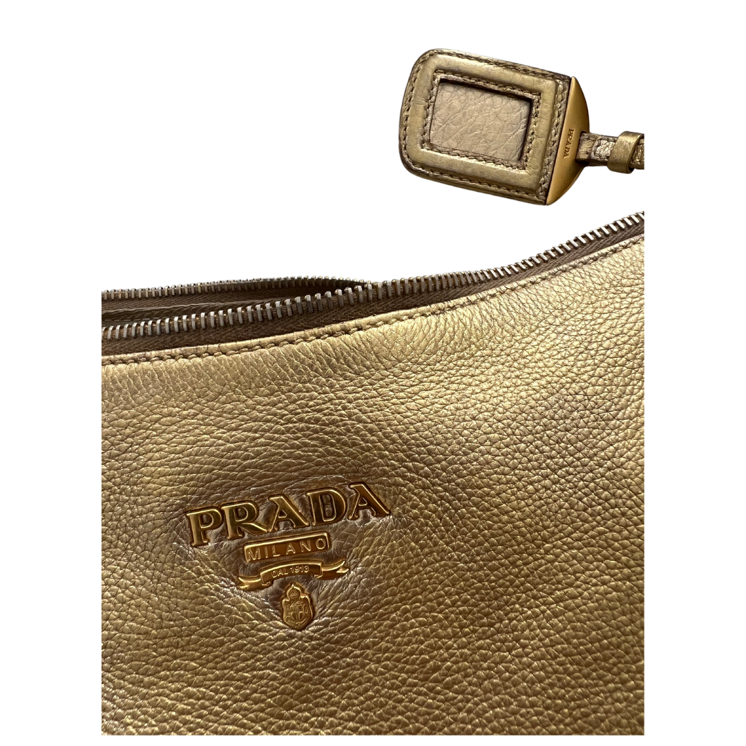 Gold early aughts it girl y2k Prada handbag
