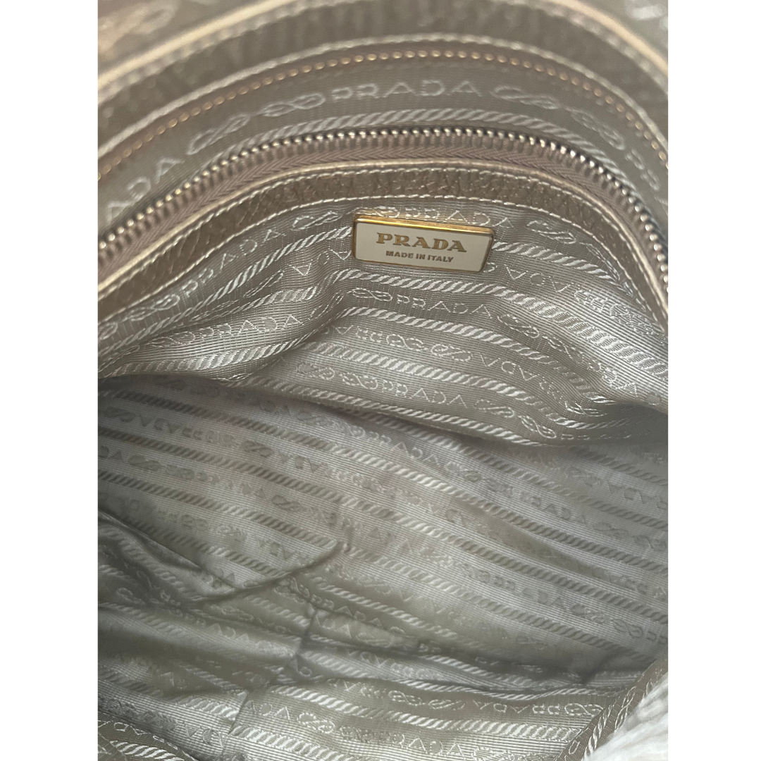 Gold early aughts y2k Prada handbag