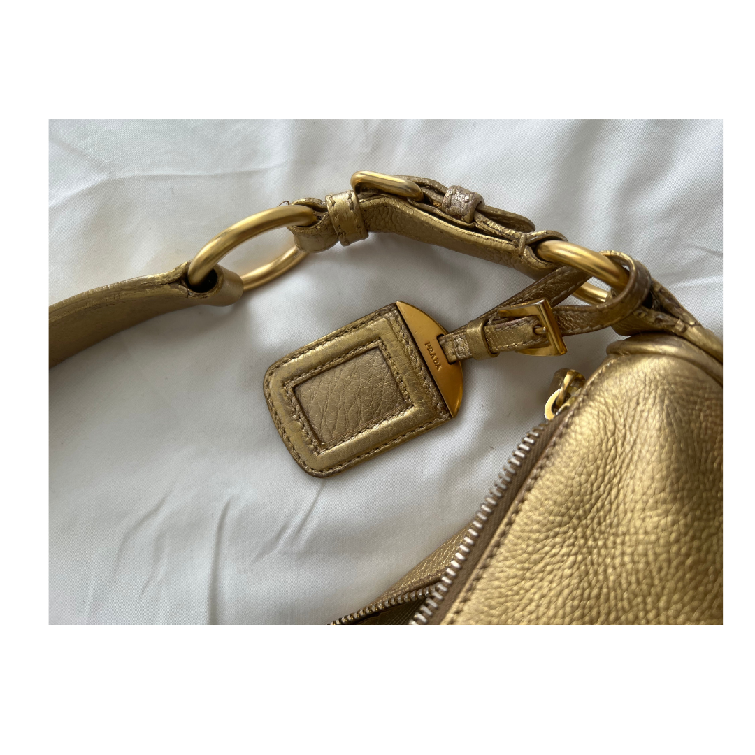 Gold early aughts it girl y2k Prada handbag