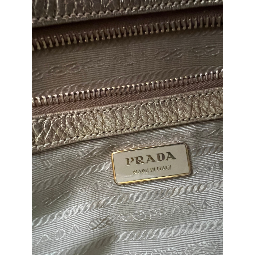 Gold early aughts y2k Prada handbag