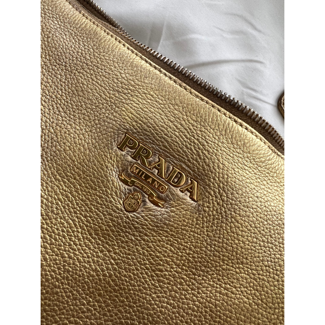 Gold early aughts it girl y2k Prada handbag