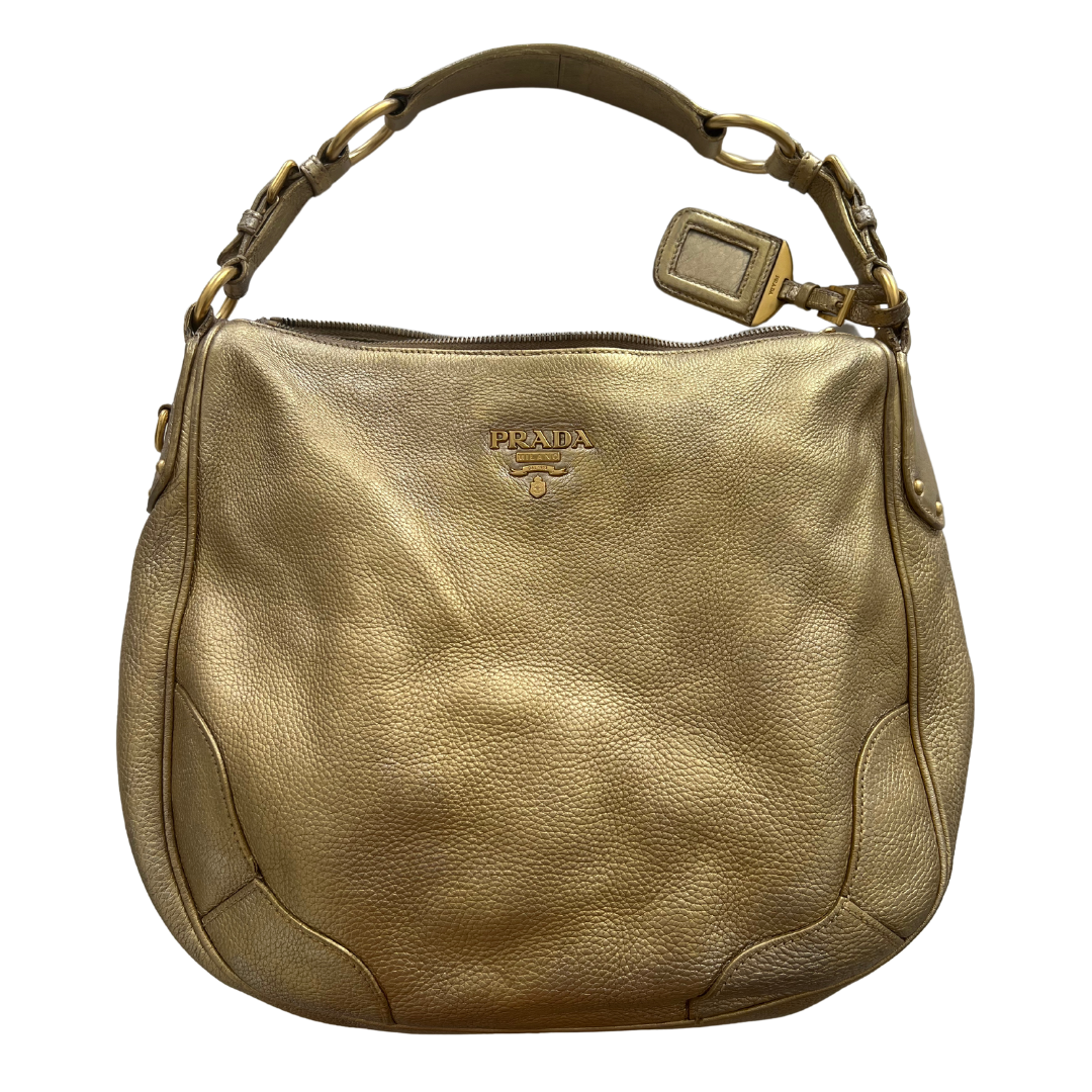 Gold early aughts it girl y2k Prada handbag